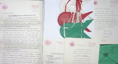 Photo of some of the 1973 letters, ticket and purses.