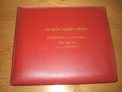 Leather photo album containing photos from the ceremony - 1976